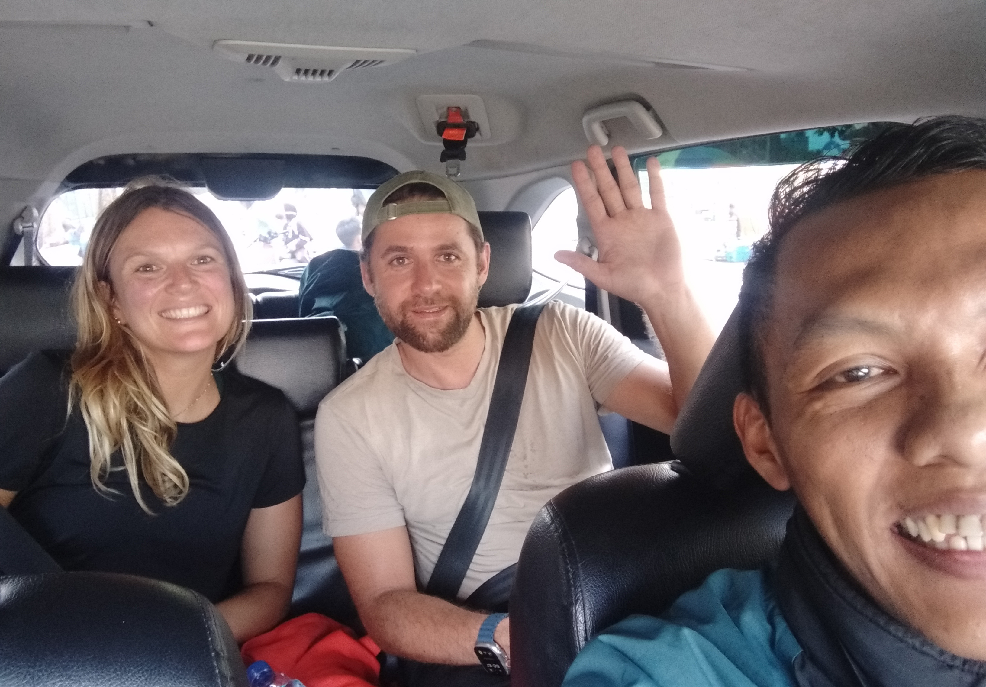 Scenic view of Kawah Ijen volcano at sunset with colorful sky and crater lake